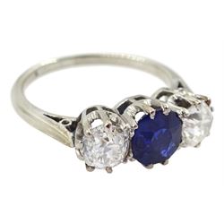 Early 20th century gold three stone old cut diamond and round sapphire ring, sapphire approx 0.60 carat, total diamond weight approx 1.00 carat