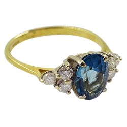 18ct gold oval blue topaz and six stone diamond ring, hallmarked