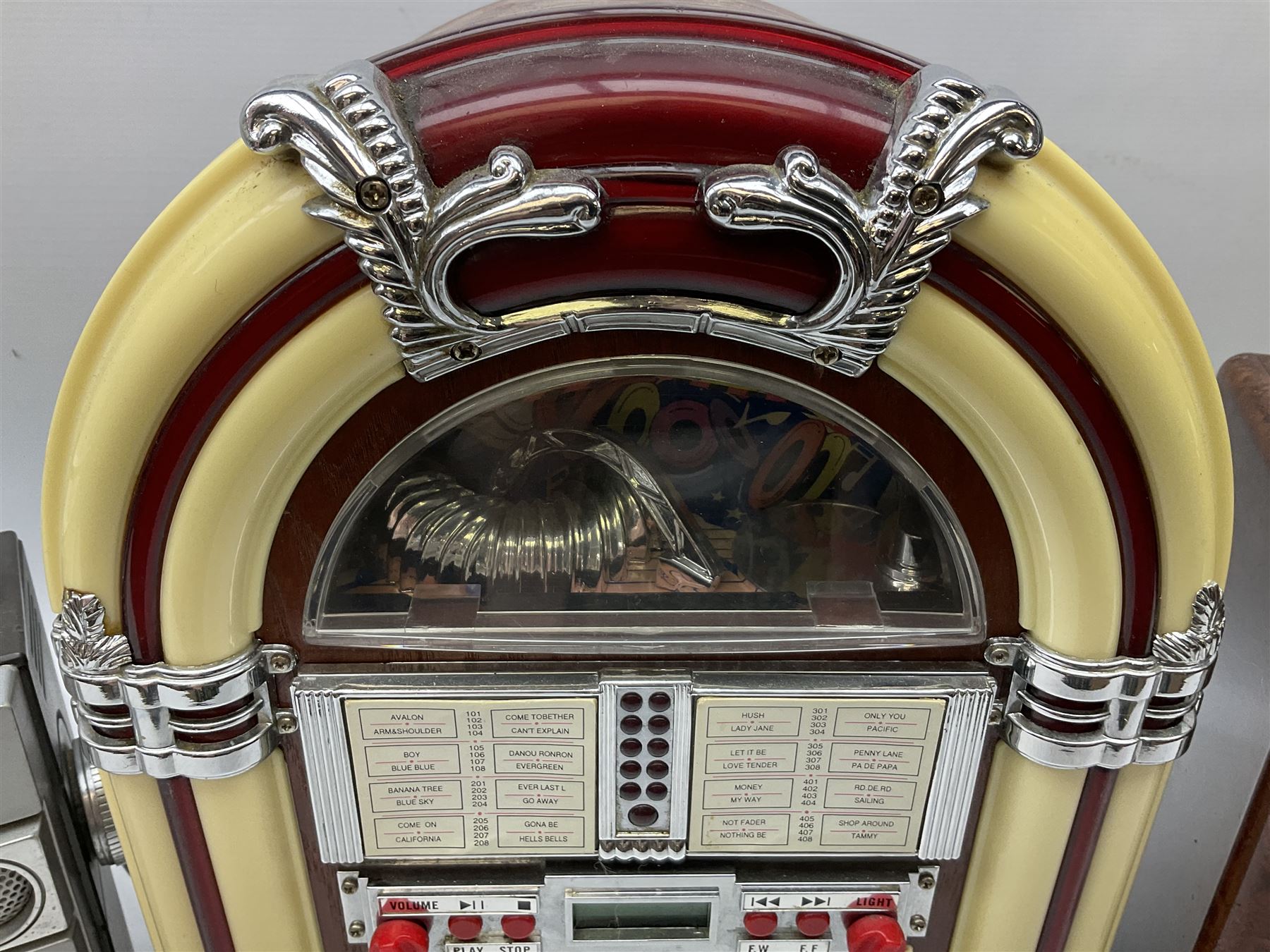 CD player in the form of a juke box, together with a Ferguson stereo and a vintage style radio