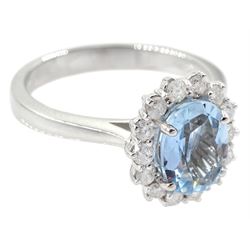 18ct white gold oval aquamarine and round brilliant cut diamond cluster ring, hallmarked, aquamarine approx 1.00 carat, total diamond weight approx 0.30 carat