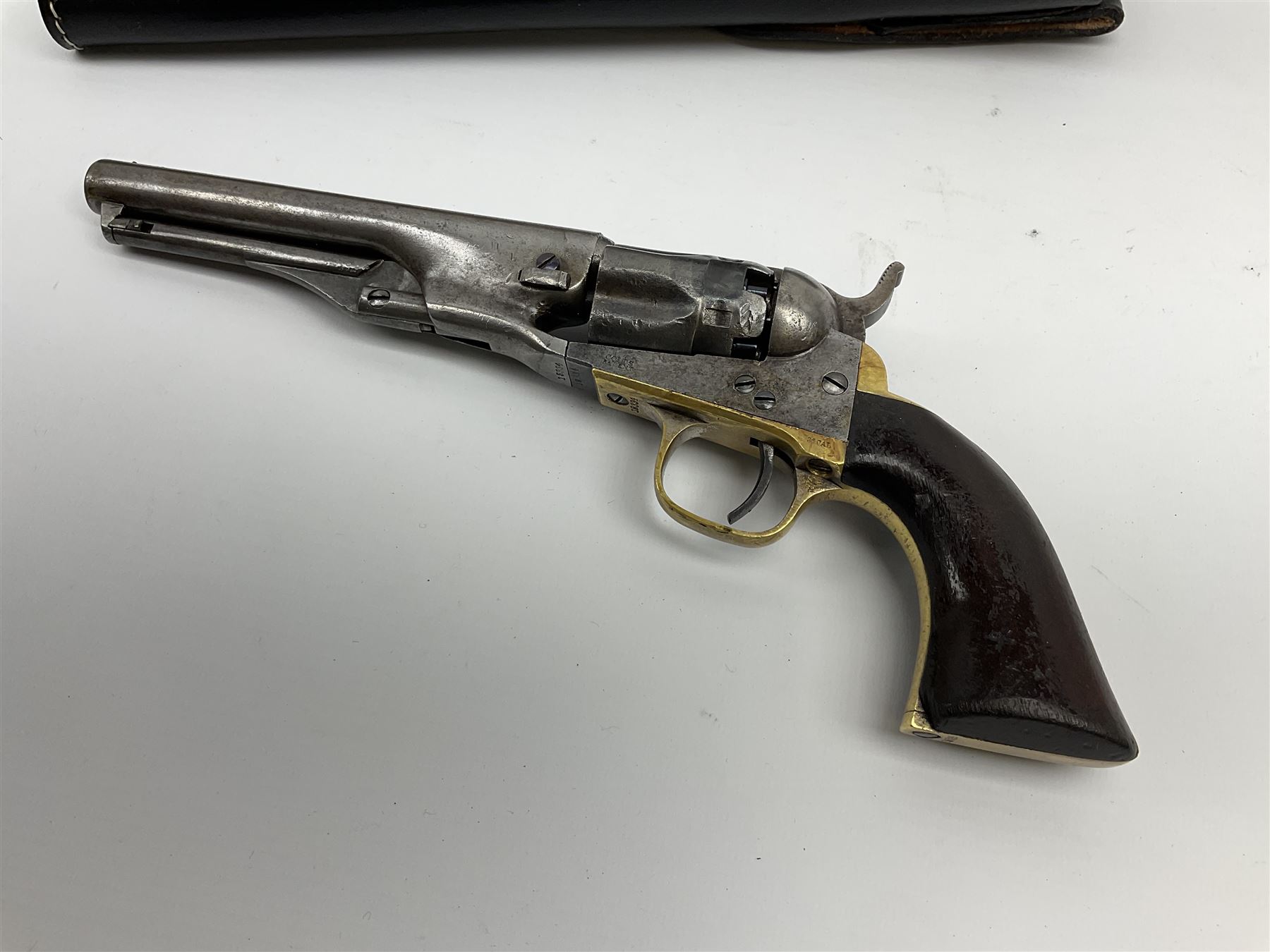 Colt .36 calibre percussion five-shot police pocket revolver, all parts with matching serial no.18334, 14cm barrel marked 'Address Col Saml Colt New York US America' with under barrel swivel rammer, brass trigger guard and backstrap with two-piece wooden grips L28.5cm; with modern bullet maker and leather holster.