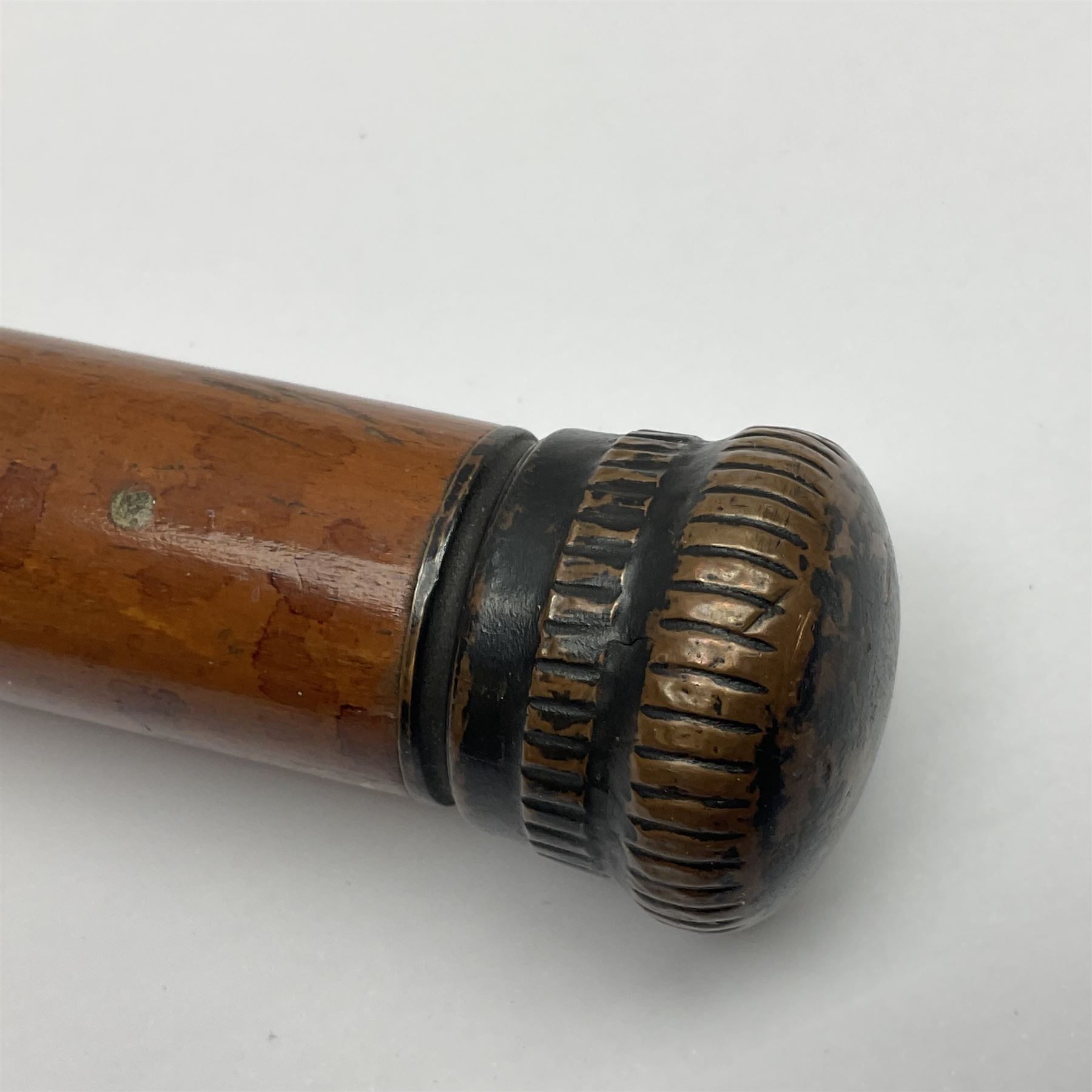 19th century malacca walking cane, the screw threaded domed cover opening to reveal vacant recess, above a further screw threaded opening revealing a removable glass vial with stopper, glass vial L41cm, cane L89.5cm