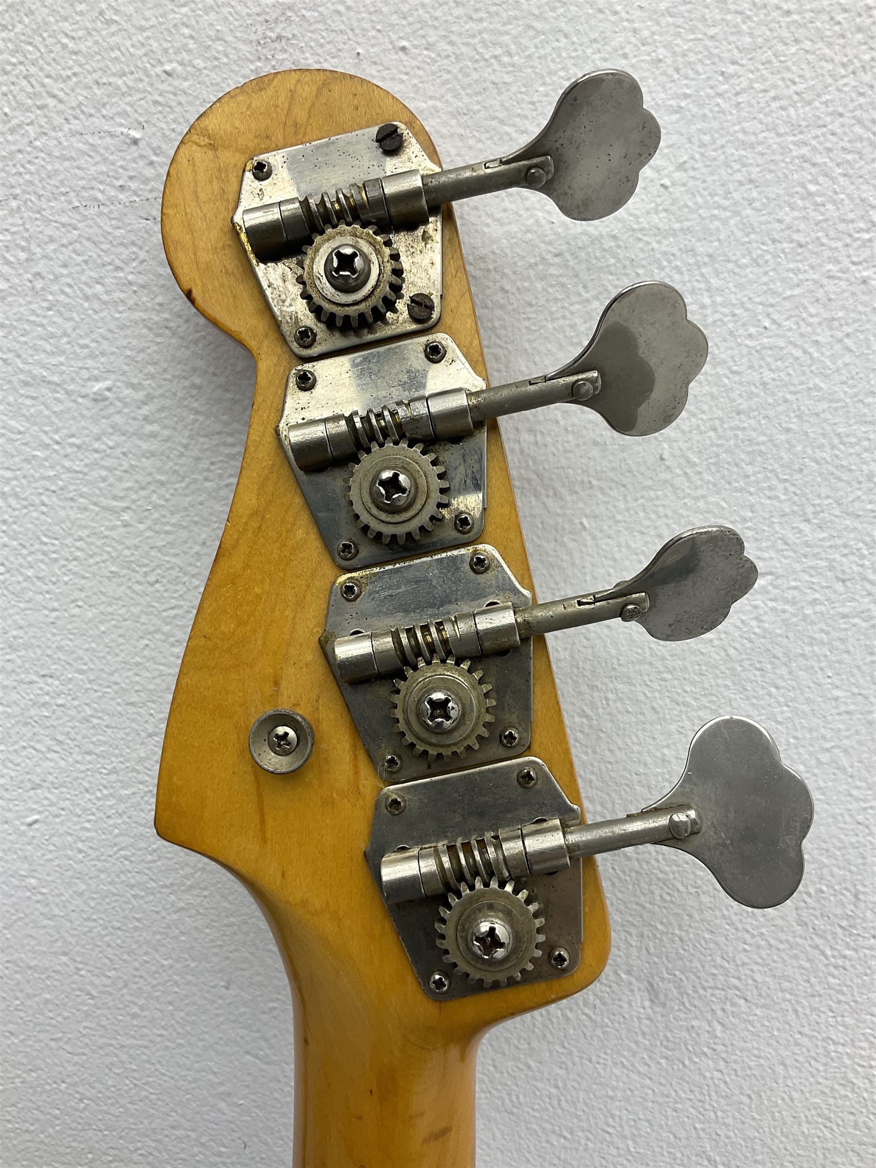1962 Fender Precision bass guitar; re-finished in natural alder in the 1970s; impressed date code 5NOV62C to end of neck and serial no.90537 to back plate; L115.5cm; in replacement hard carrying case