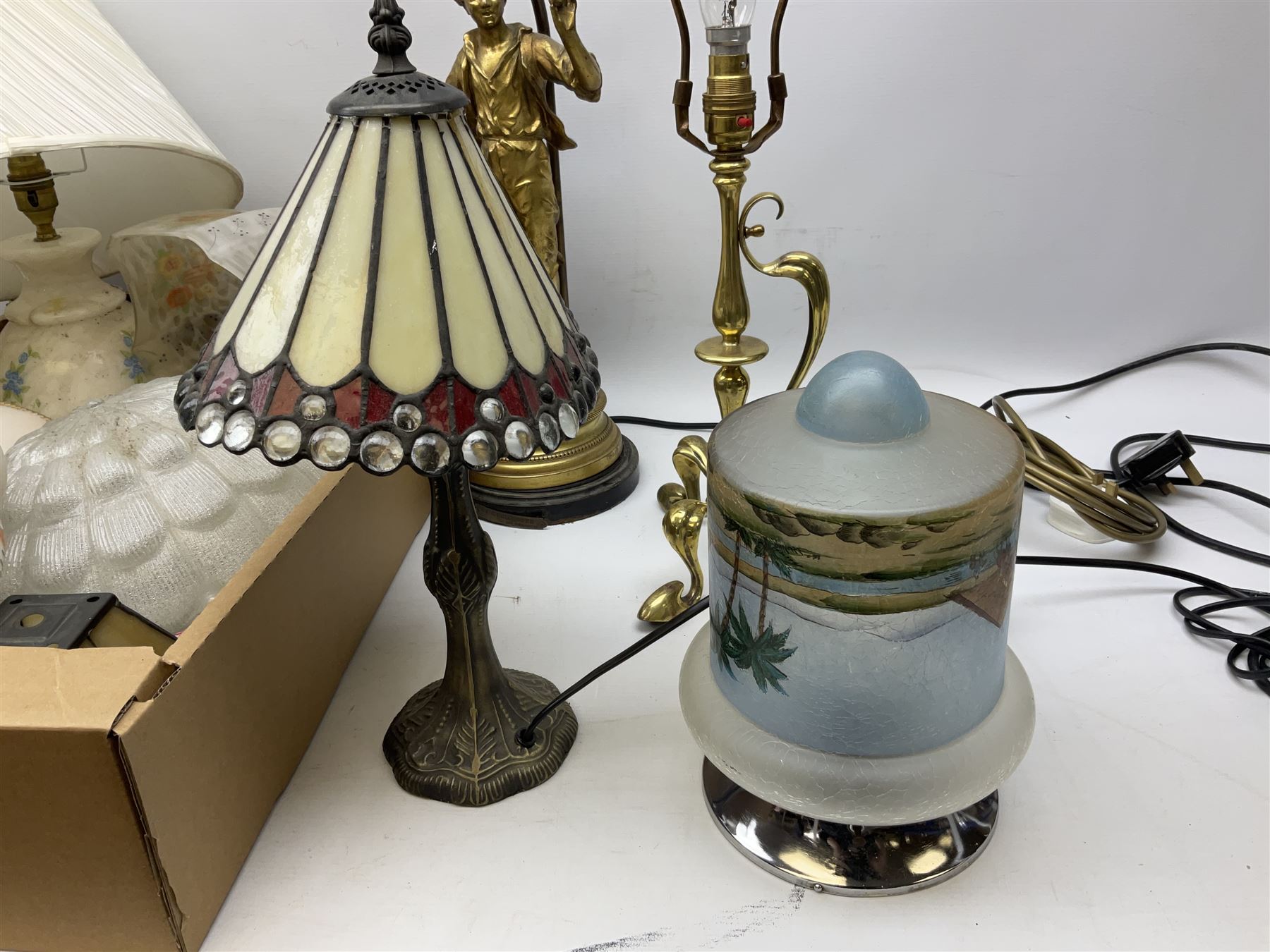 Brassed lamp modelled as a male with basket and fruit after Rancoulet, Tiffany style table lamp, brass table lamp, glass shades etc