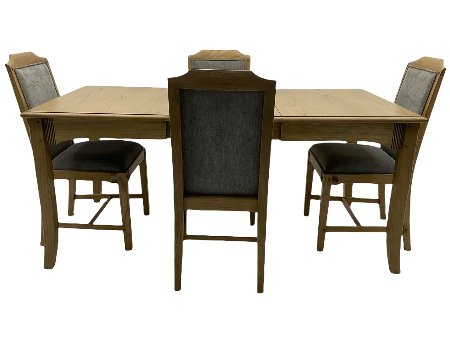 Windsor by Mark Devany oak rectangular extending dining table, with butterfly leaf, and four chairs with upholstered seats and backs