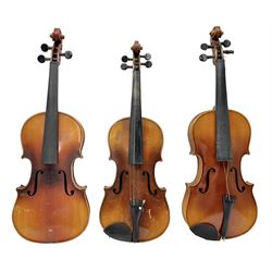 Czechoslovakian violin c1920 with 36cm two-piece maple back and ribs and spruce top, bears label 'Copy of Antonius Stradivarius Made in Czechoslovakia' L59cm; in carrying case; 1950s Czechoslovakian violin; and 195os Czechoslovakian three-quarter size violin; both cased (3)