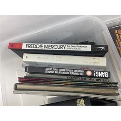 Books and ephemera, mostly related to Freddie Mercury, Queen, Leeds United, musical theatre, four of which bearing authors signatures, and other books etc, in three boxes 