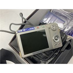 Quantity of camera accessories and equipment, to include boxed Canon EFS 17-55mm IS lens, Canon 59s camera, Olympus camera, etc