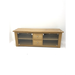 Light oak entertainment cabinet, two glazed doors flanking two drawers, stile supports, W140cm, H50cm, D43cm 