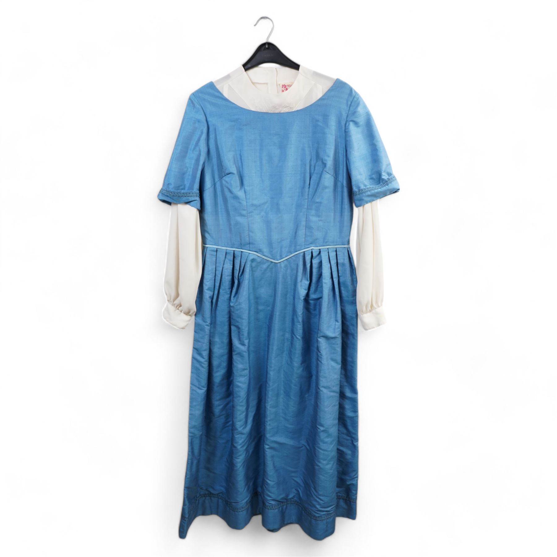 M. Caplan Furs Ottawa silver mink full length coat, another fur coat, a cape with fur trim and four vintage dresses