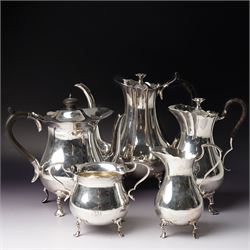 Silver matched five piece tea and coffee set of baluster form engraved with a monogram on ...