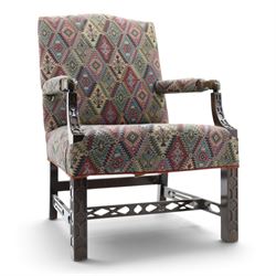 Chippendale design Gainsborough elbow chair, upholstered in kilim fabric, blind fretwork a...