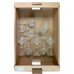 Eight crystal goblets, with hexagonal cut decoration upon a knopped stem, together with a ...