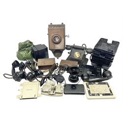 Collection of phone headsets, including GPO bakelite examples, together with other telephone parts 