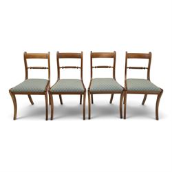 19th century mahogany extending dining table, rectangular top with rounded corners raised on turned and fluted supports with brass cups and castors, with two additional leaves; with set of eight (6+2) Regency design mahogany dining chairs, spiral-reeded back-bar over drop-in seats and sabre supports (W54cm H85cm)
