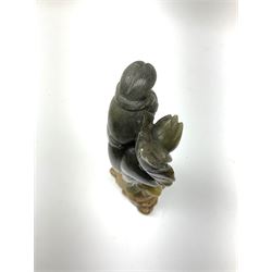 A Chinese carved jade figure modelled as Guanyin, including base H23.5cm. 