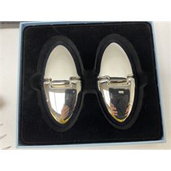 Cased pair of Wedgwood silver-plate book stands, silver-plate baby feeding spoon and pusher in box, other silver-plated cutlery