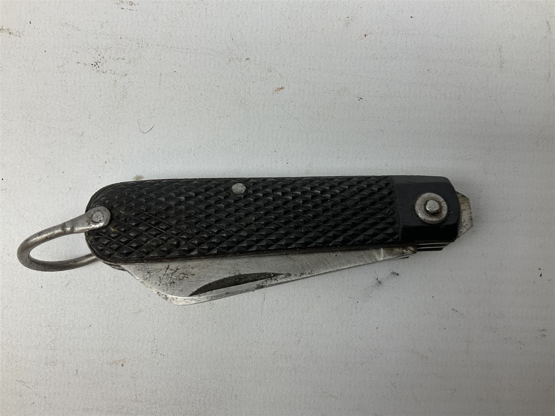 WW2 British army folding jack/clasp knife with blade and can opener marked with broad arrow and date 1944; a similar unmarked British army folding three-blade knife; and another later similar British Army knife marked Wade & Butcher Sheffield England (3)