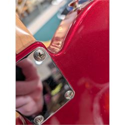 Fender Telecaster electric guitar, serial no. T021384 made in Japan c.1994, with Candy Apple Red body, white scratch plate and maple neck, guitar L98cm