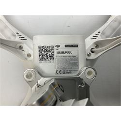 DJI Phantom 2 Vision Plus 3.0 drone, with controller, battery pack, blades, chargers and other accessories in fitted foam lined hard plastic case