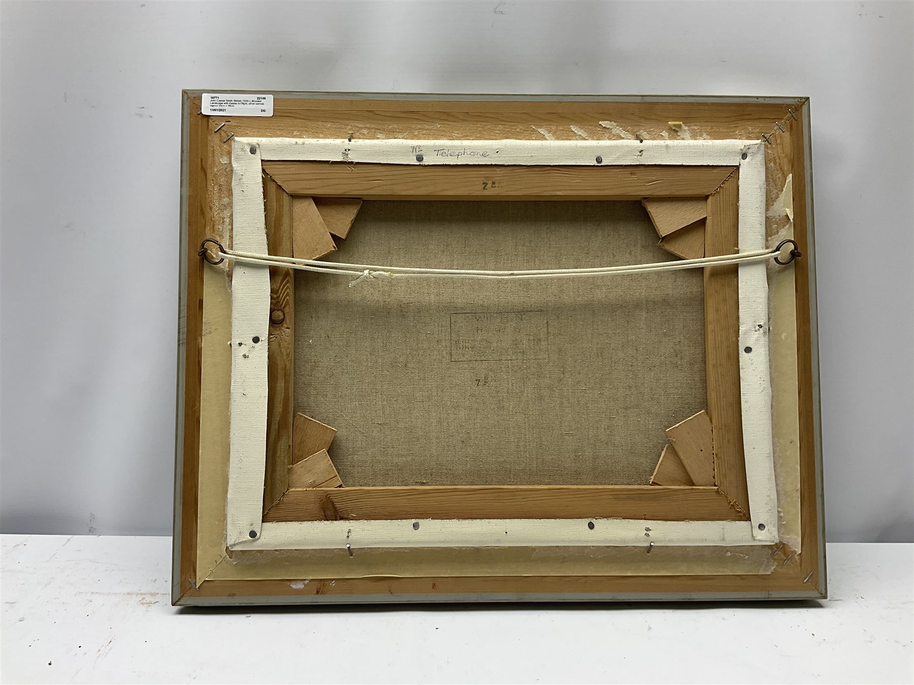 John Caesar Smith (British 1930-): Wooded Landscape with Geese in Flight, oil on canvas signed 29cm x 39cm