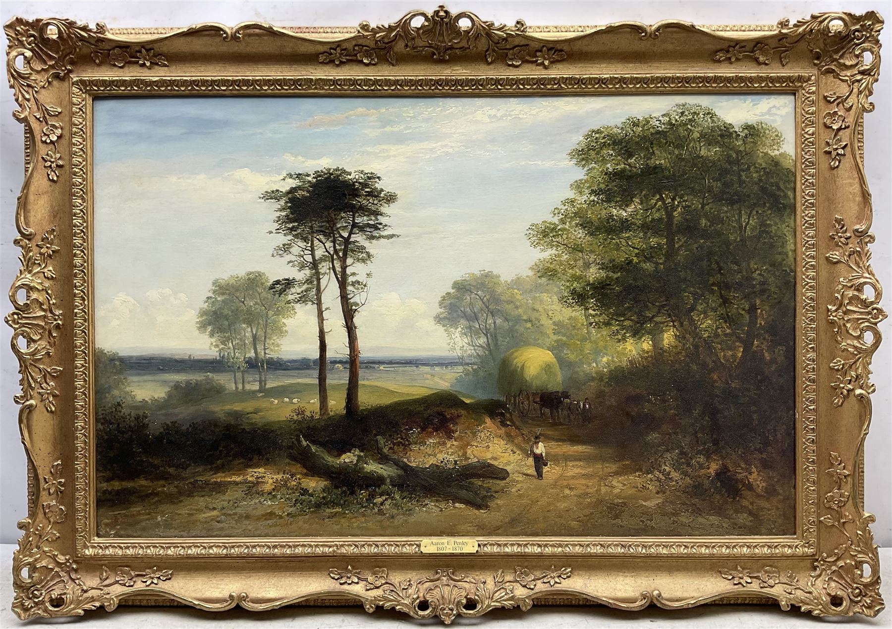 Aaron Edwin Penley (British 1806-1870): Haycart on a Wooded Track, oil on canvas signed and dated 1858, 55cm x 87cm 
Provenance: with WH Patterson, London, label verso