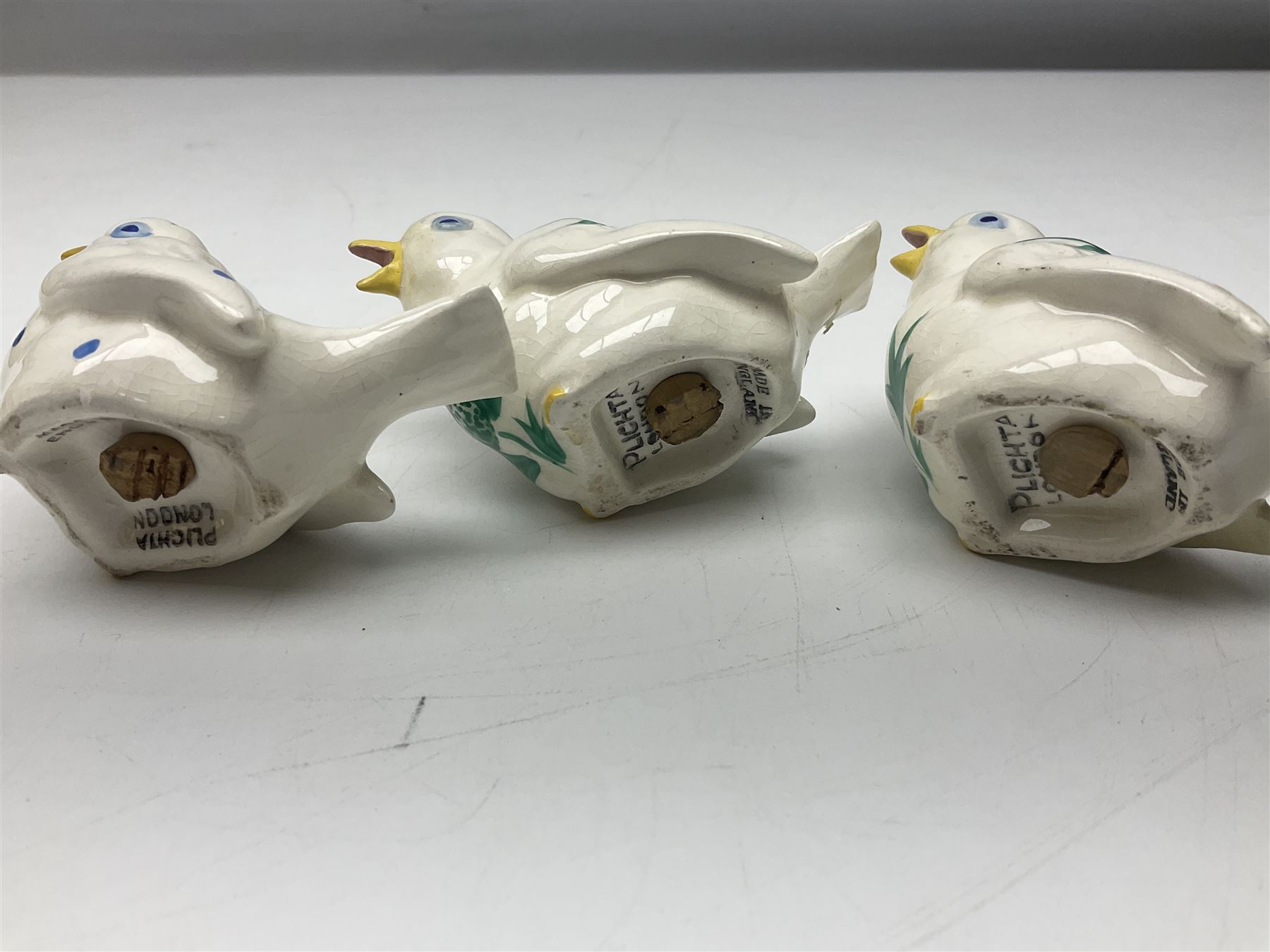 Three Plichta shakers modelled as birds