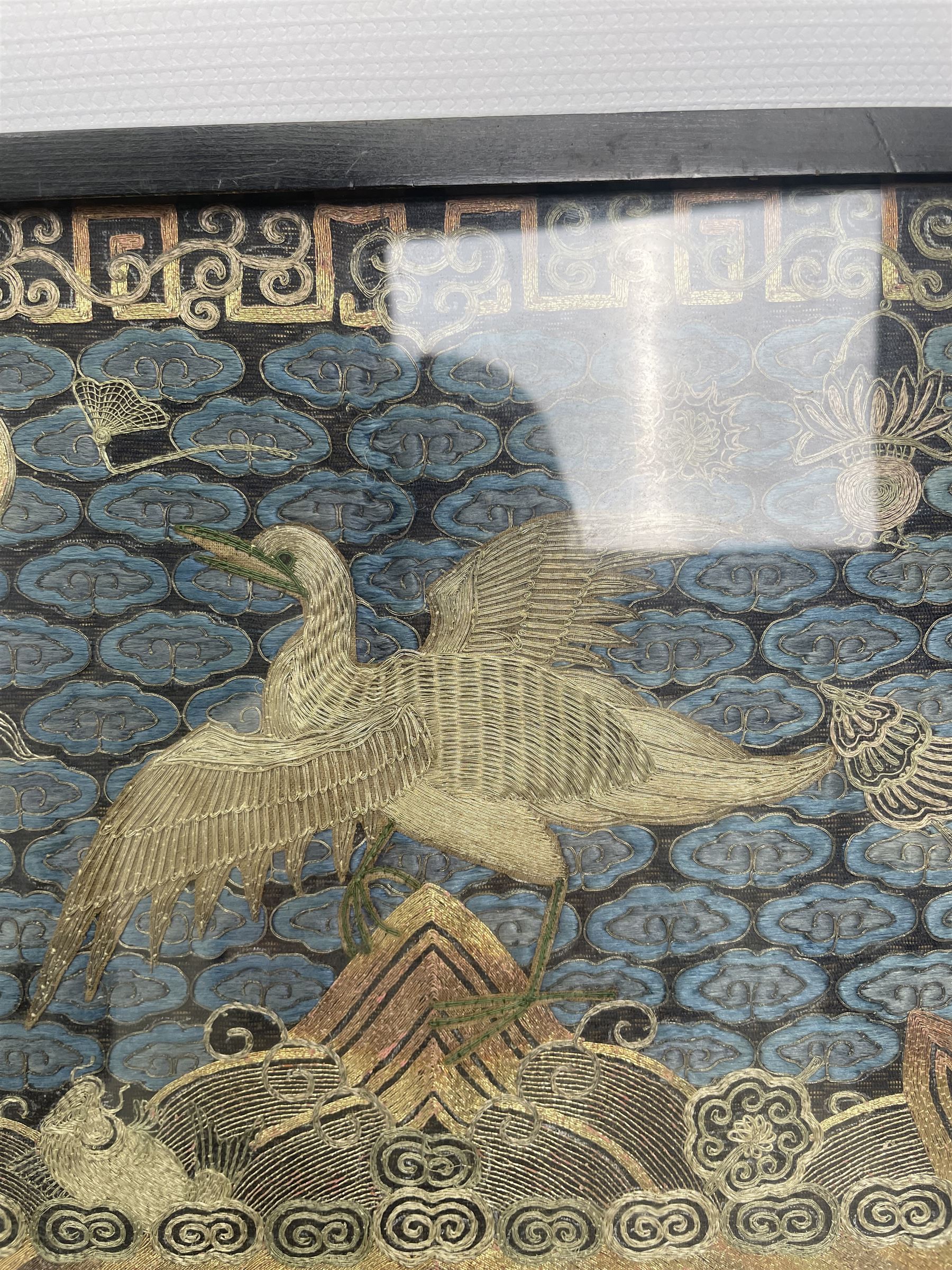 Early 20th century Chinese silk work tapestry, depicting a crane flying over a river, H30cm 