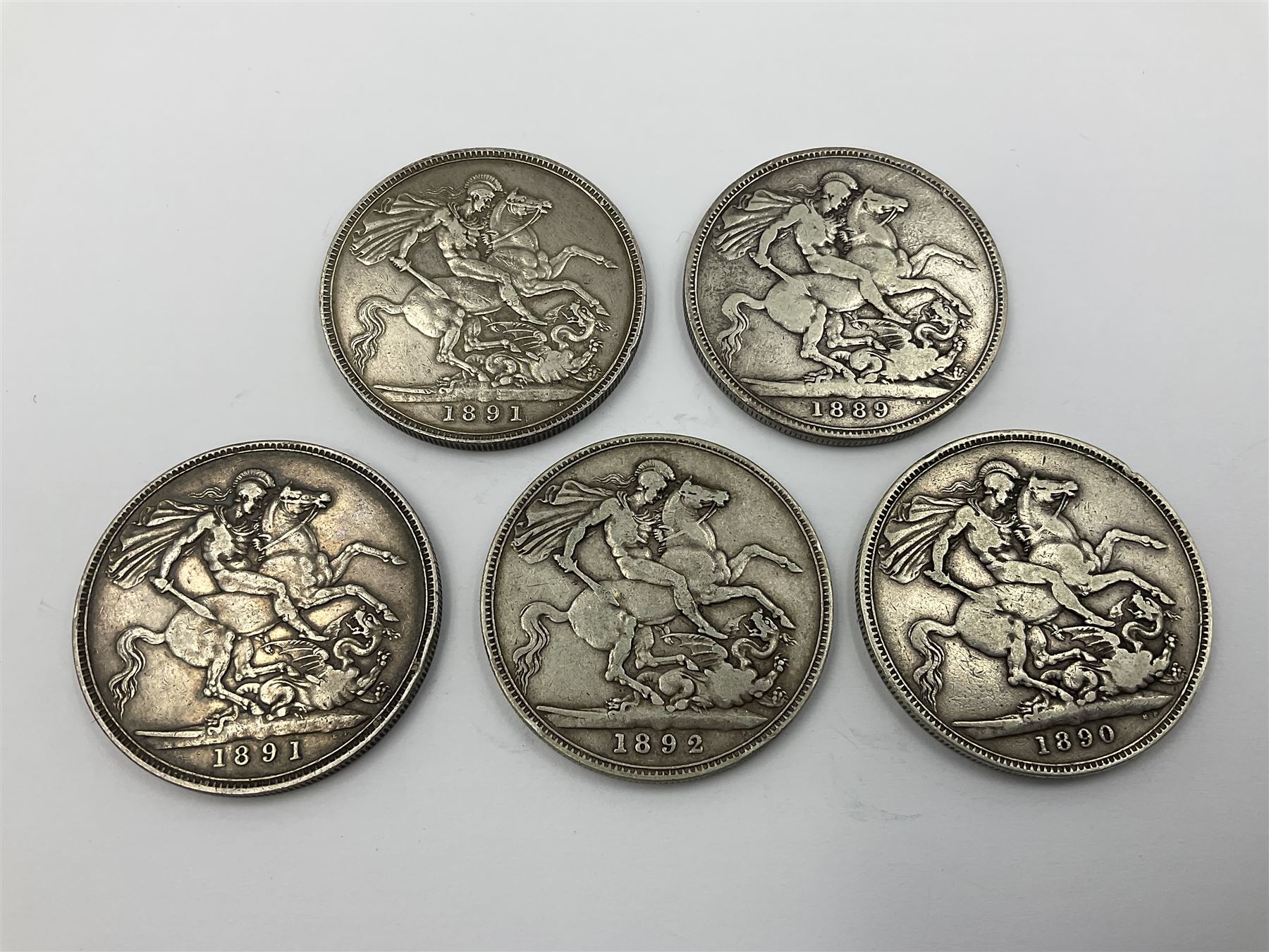 Five Queen Victoria silver crown coins, dated 1889, 1890, two 1891 and 1892