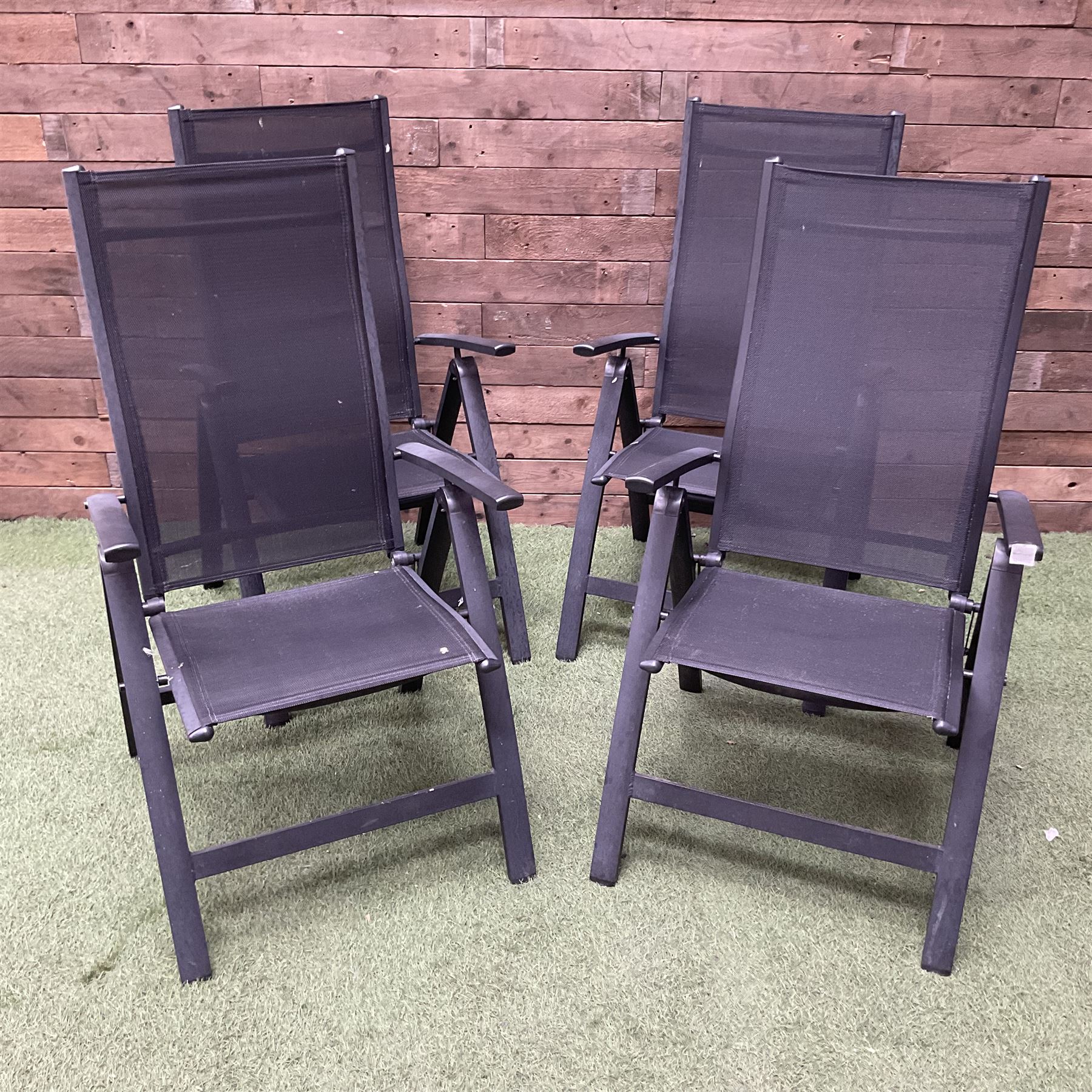 Four metal and mesh fabric folding garden chairs in black - THIS LOT IS TO BE COLLECTED BY APPOINTMENT FROM DUGGLEBY STORAGE, GREAT HILL, EASTFIELD, SCARBOROUGH, YO11 3TX