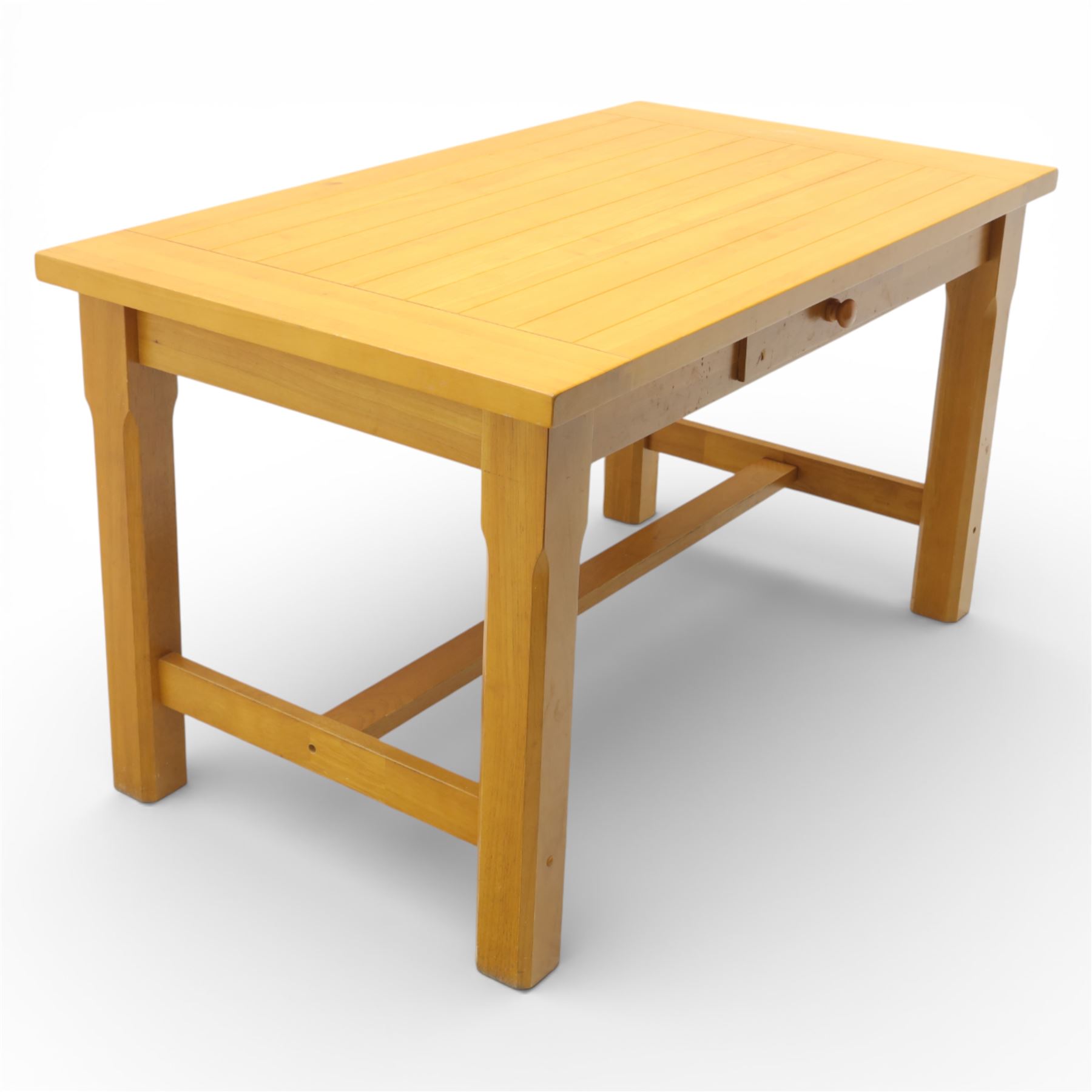 Solid oak dining table and set of seven pine farmhouse chairs including two carvers, rectangular top with tongue and groove style finish, supported a 'H' stretcher with square chamfered legs, pine farmhouse chairs with central splat and turned legs