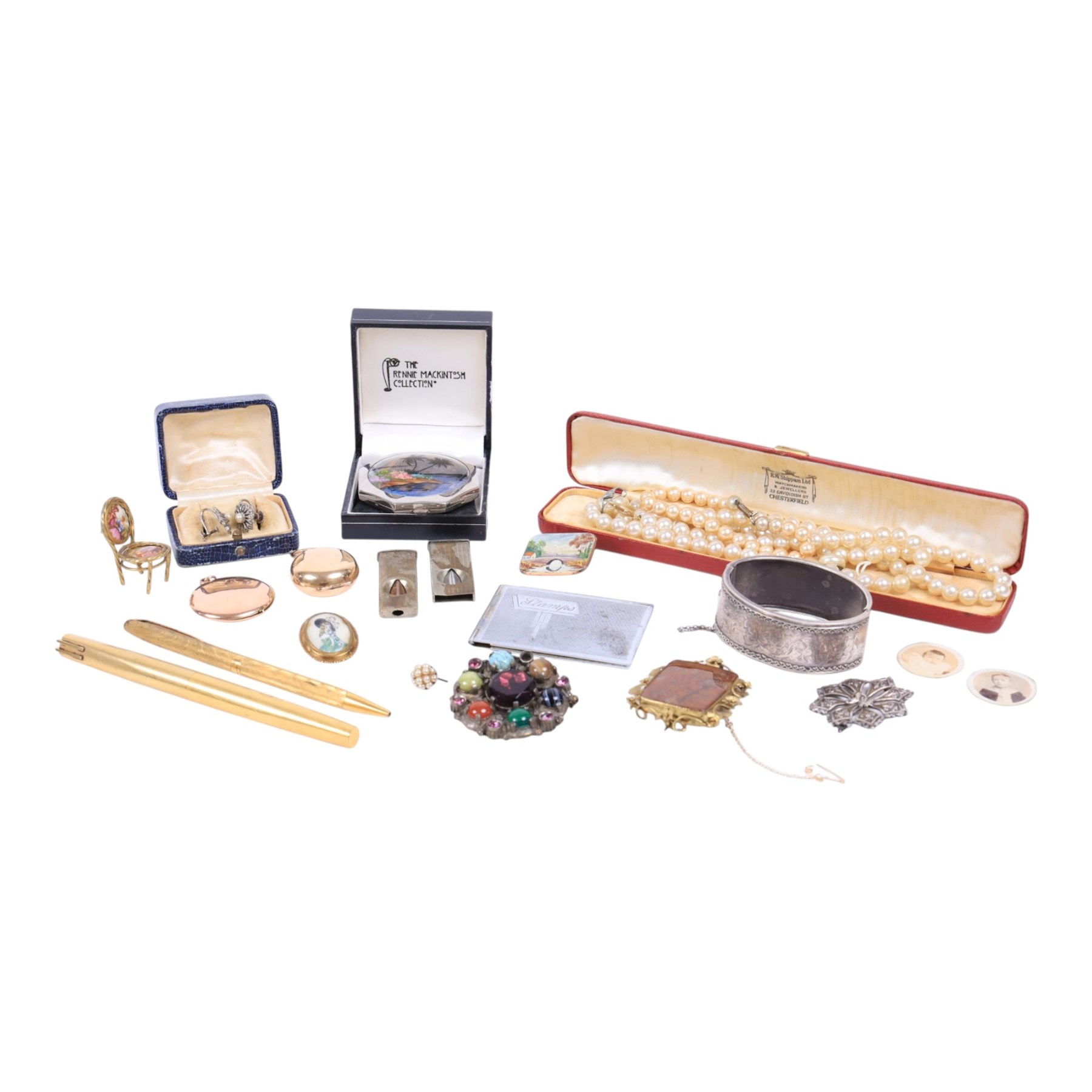 Silver bangle, silver-gilt locket, gold plated moss agate brooch, costume jewellery, two EPNS cigar cutters and stamp book, Vogue compact mirror with butterfly wing design by Thomas L Mott and Waterman fountain pen with 18ct gold nib and a Waterman ballpoint pen