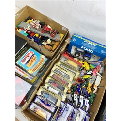 Collection of die cast models including a Ertil 1/32 Ford TW5 Tractor, Matchbox, Models of Yesteryear and other vehicles in four boxes