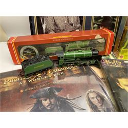 Hornby 00 Gauge boxed locomotive model, Pirates of the Caribbean chess set, Harry Potter cards and figures, calendars and other toys etc