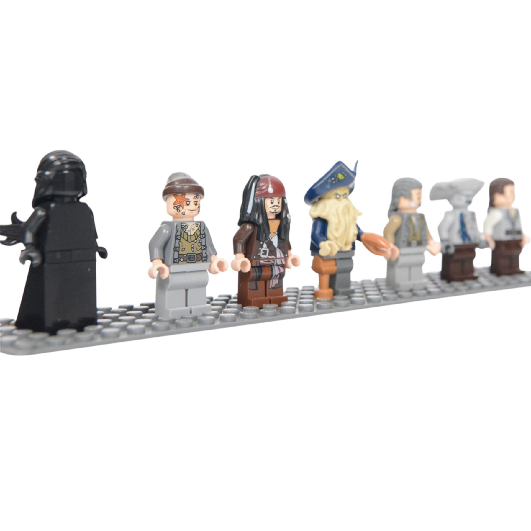 Lego Pirates of the Caribbean Black Pearl minifigure set no. 4184, comprising Black Pearl figurehead, Bootstrap Bill, Captain Jack Sparrow, Davy Jones, Joshamee Gibbs, Maccus and Will Turner