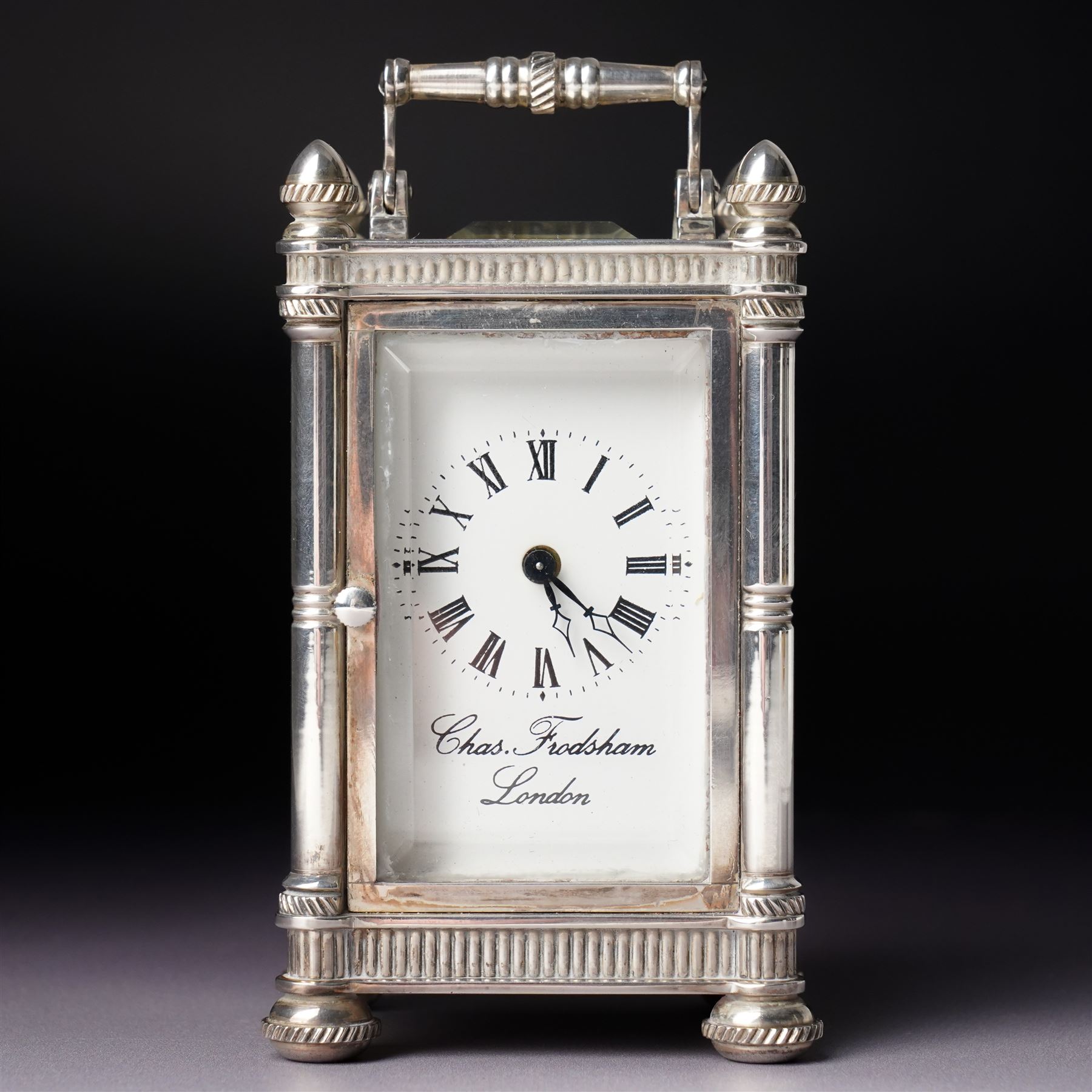 Chas Frodsham, London - Miniature carriage clock with white dial in engraved silver case on compressed bun feet, London assay H10cm 
