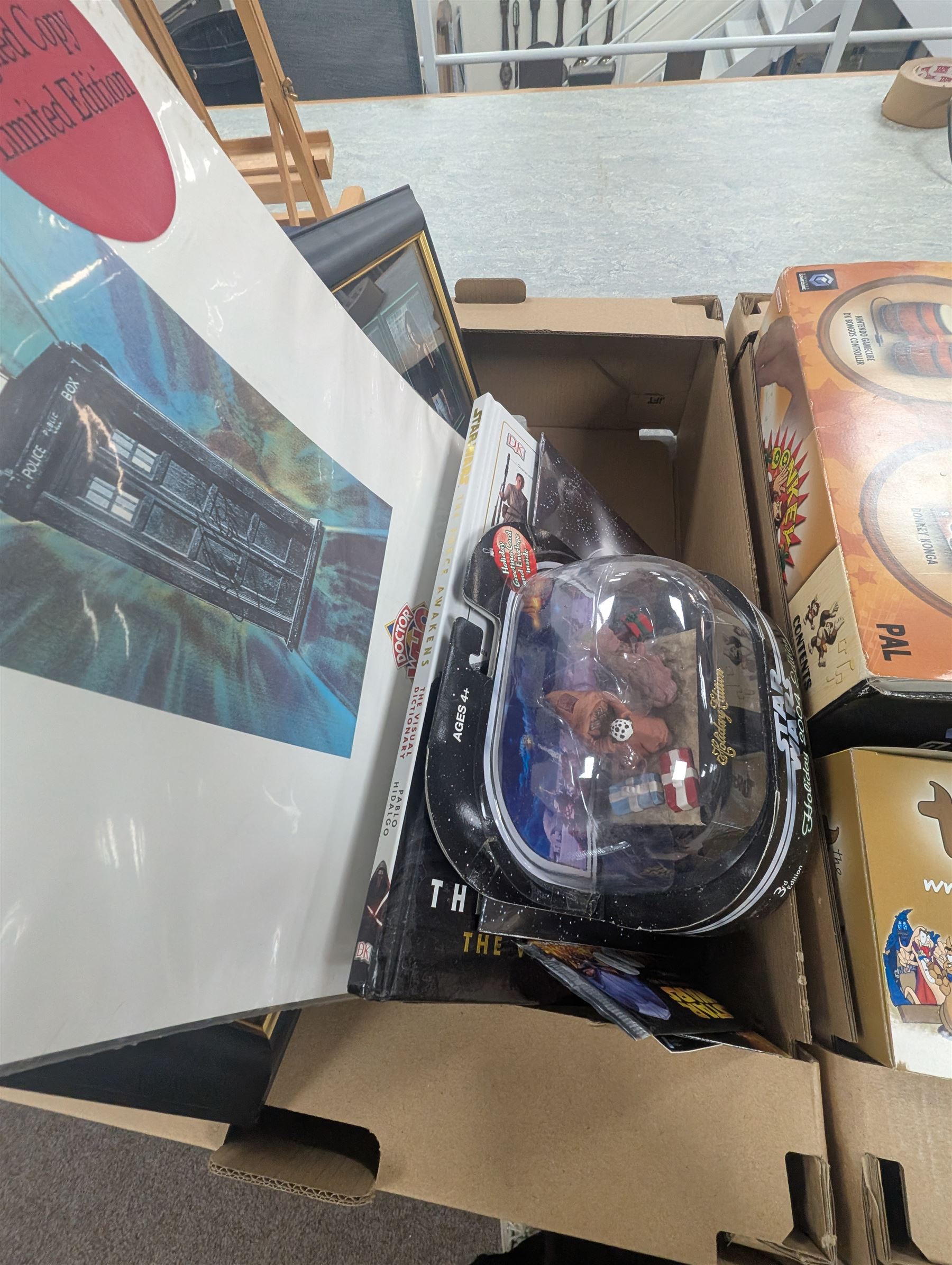 Toys and collectables, including Star Wars reference books, Nintendo Gamecube Donkey Konga Bongos, signed limited edition Doctor Who calendar, four The Turds figures, Tardis plastic storage box, etc