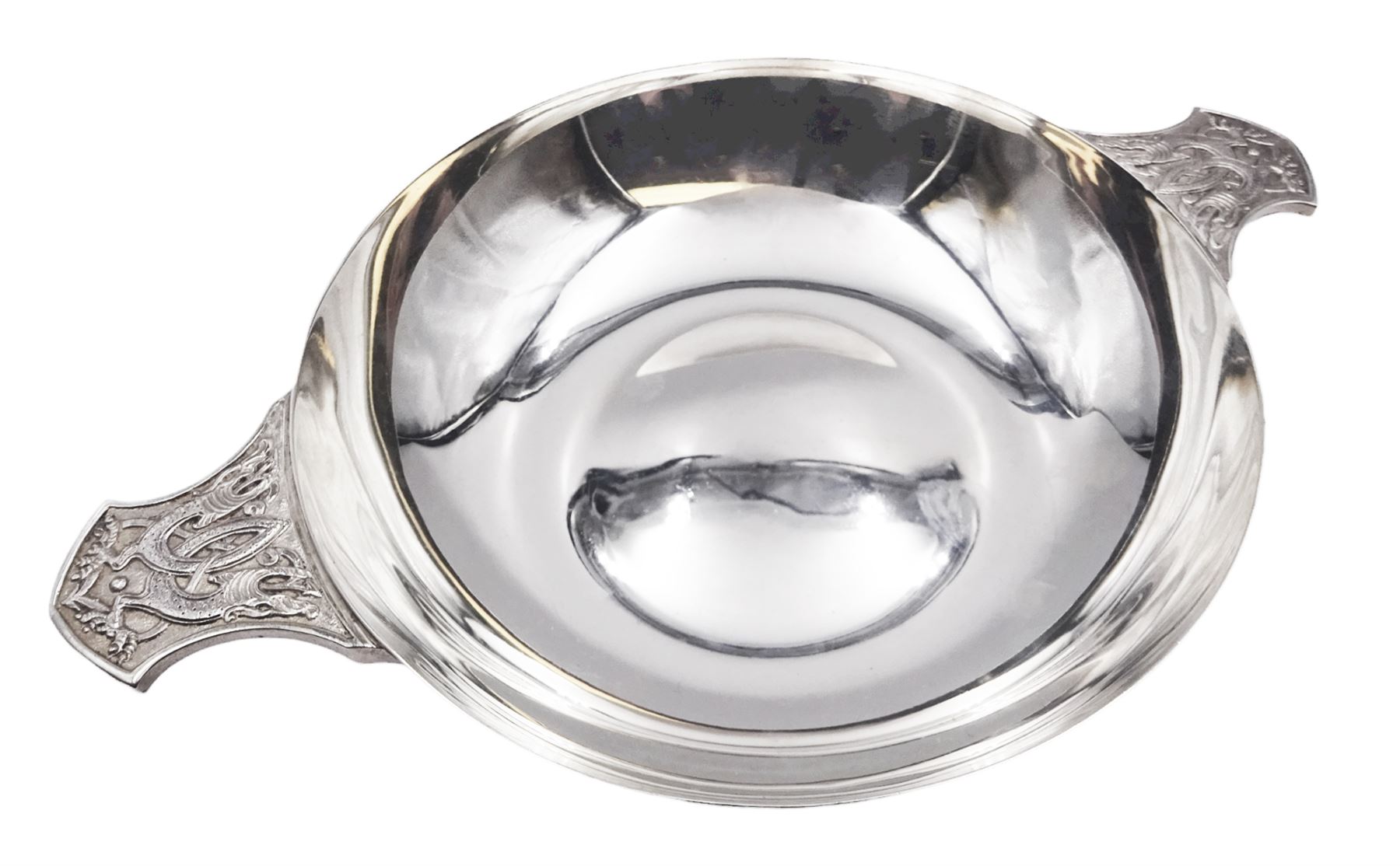 Large modern silver Quaich, of circular form with twin handles cast with stylised dragon motifs, hallmarked Birmingham 2009, makers mark W&W, D18cm, approximate weight 11.14 ozt (346.8 grams)