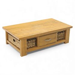 Contemporary pine coffee table, rectangular planked top with moulded edge, fitted with a c...