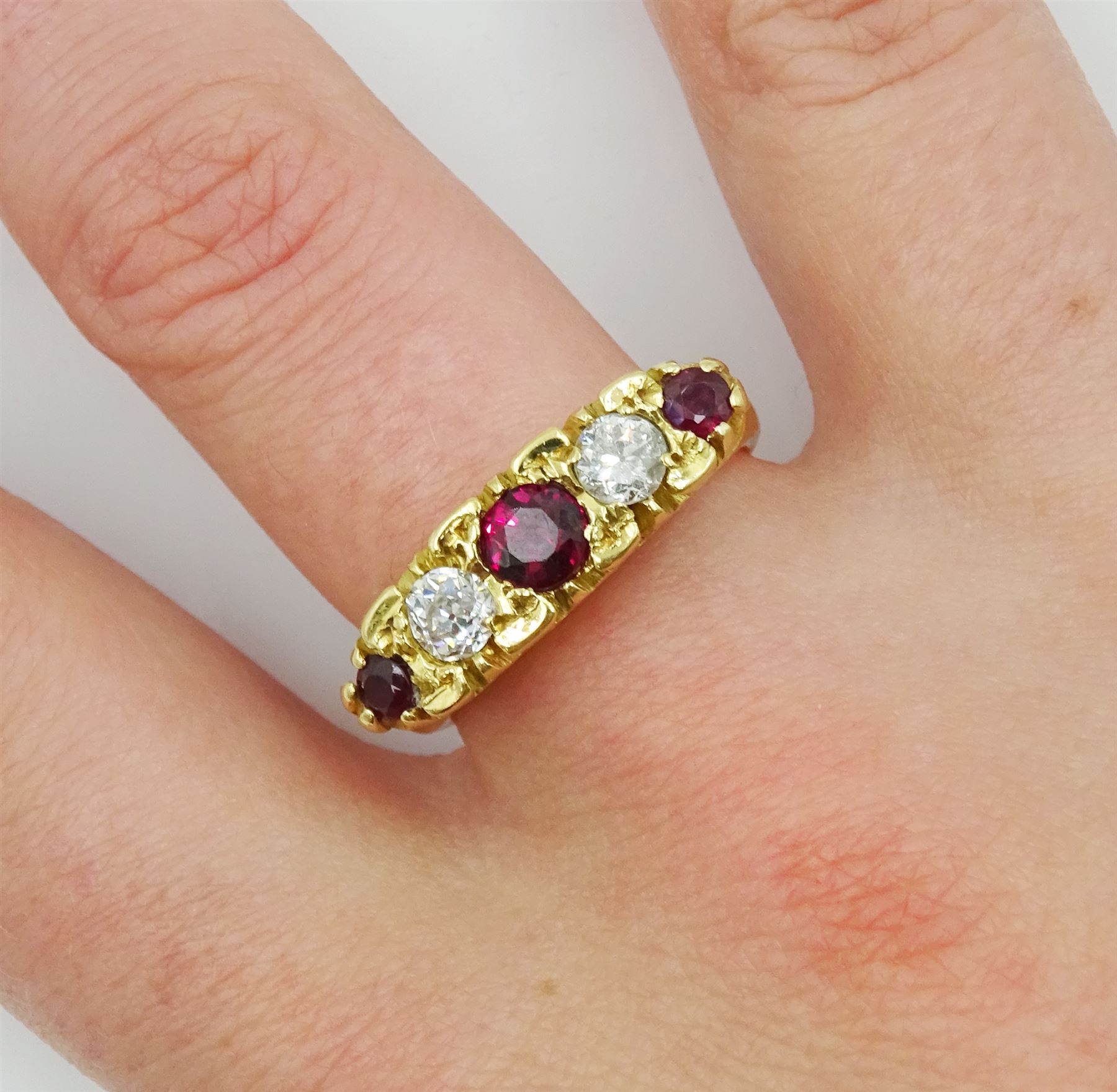 18ct gold five stone round ruby and old cut diamond ring, London 1976, total diamond weight approx 0.45 carat, total ruby weight approx 0.50 carat