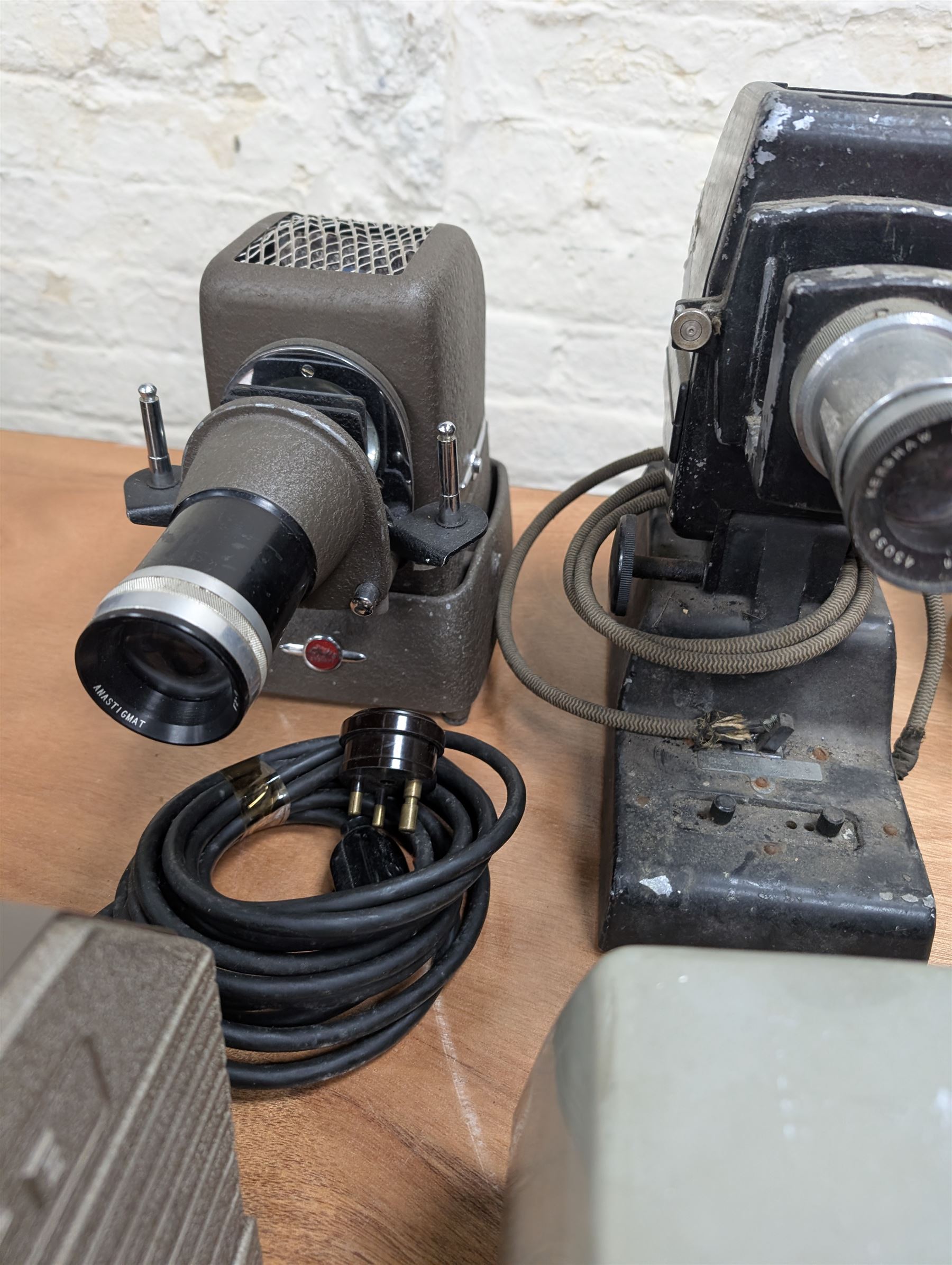 Eight vintage projectors, including Bell & Howell Moviemaster, Aldis 303, Boots Colormaster, Ernst Plank, Hi-Lite etc