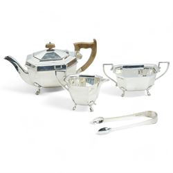 Silver three piece tea set of panel side