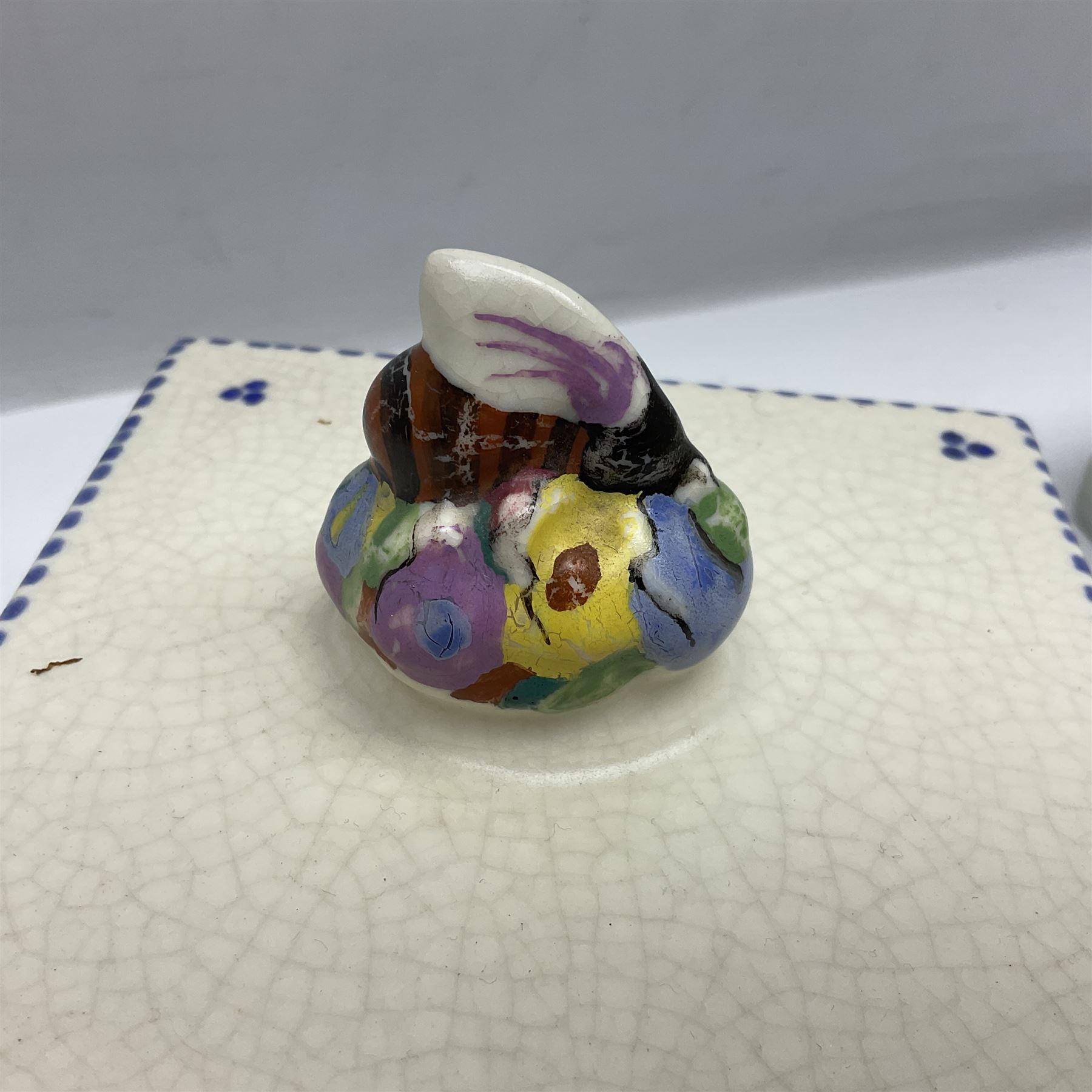 Clarice Cliff for Wilkinson Ltd Crocus Bizarre beehive honeypot painted in the Crocus pattern, together with two beehive Beswick honey pots, Poole square honey pot etc (14)