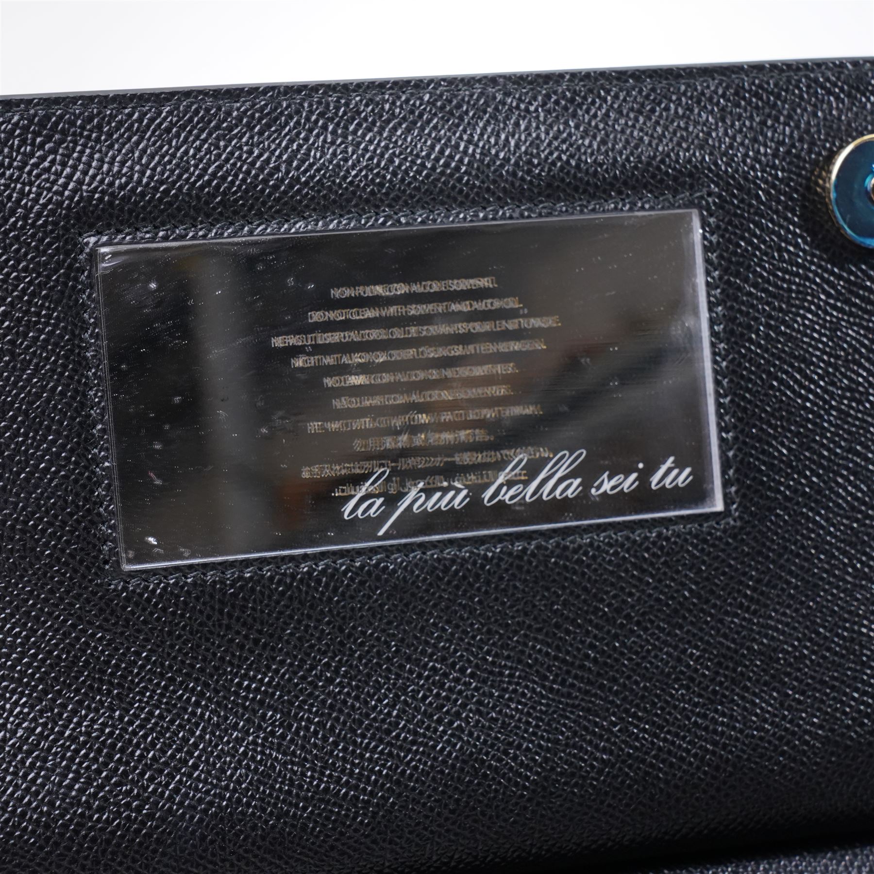 Dolce & Gabbana - 'Sicily Clock’ Medium Bag, from the Fairytale collection (Autumn/Winter 2016), in structured black textured leather, the front elaborately applied with a jewelled clock-face motif and floral embellishments, with top handle and detachable shoulder or crossbody strap, a limited production piece, unused with original box and dust bag