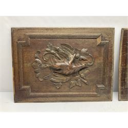 Pair of oak furniture door panels, carved in relief with a fox to one and a hound to the other, together with a pair of smaller oak panels, carved in relief with a hare to one and a grouse to the other, doors W63.cm x H62cm, panels W43cm x H60cm