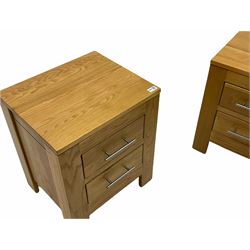 Two oak bedsides, each fitted with two drawers 
