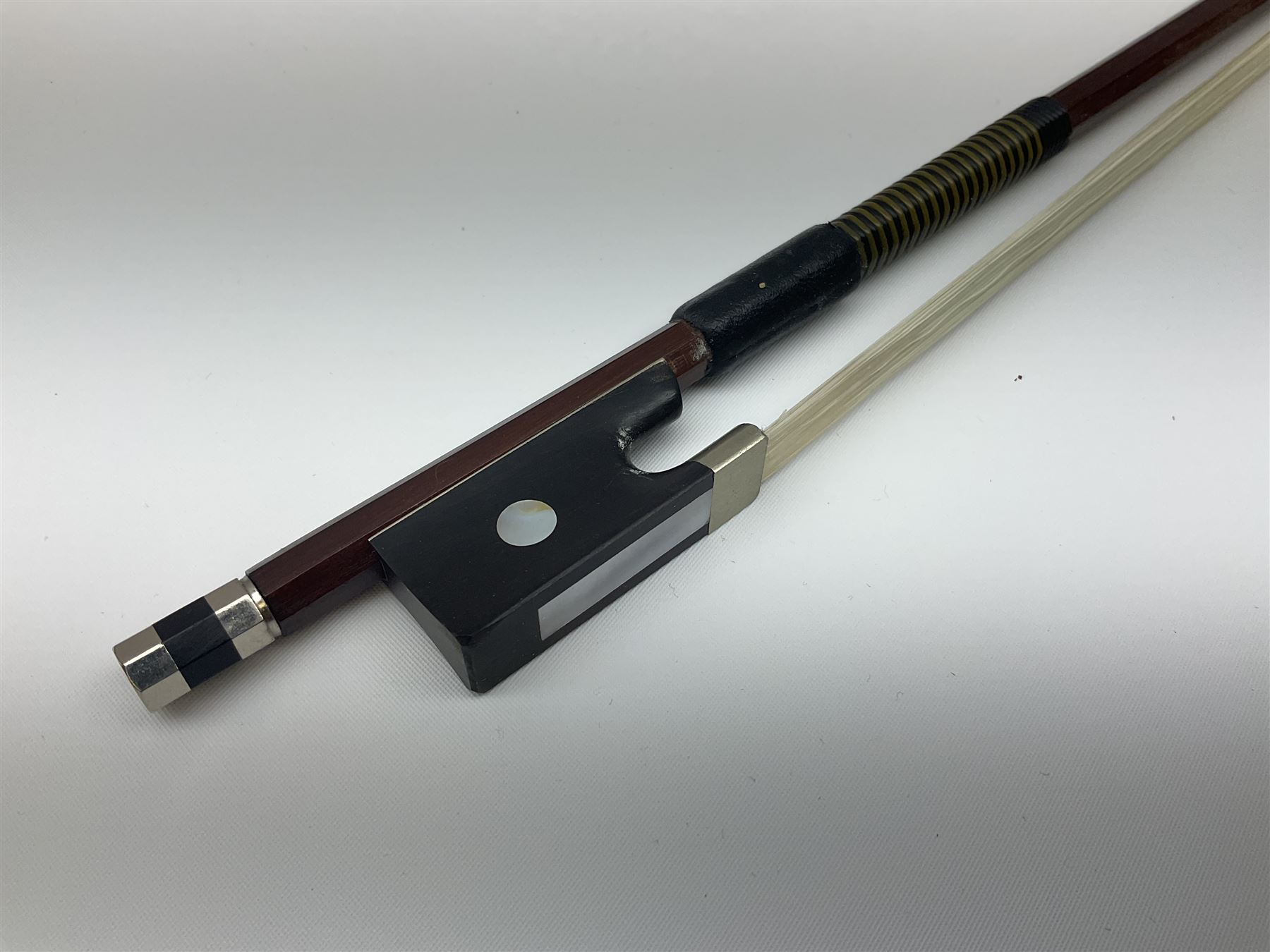 German Saxony violin c1900 with 35.5cm two-piece medium grain maple back and ribs and medium grain spruce top; bears label 'Jacobus Stainer in Absam prope Oenipontum 17xx Made in Germany', 59.5cm overall; with modern bow (2)