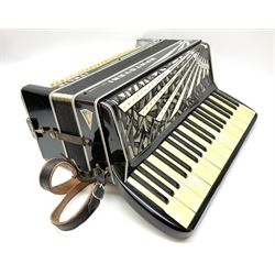 Italian Mantovani piano accordion with Art Deco style black and white case, twenty-four keys and one-hundred and twenty buttons L52cm in carrying case