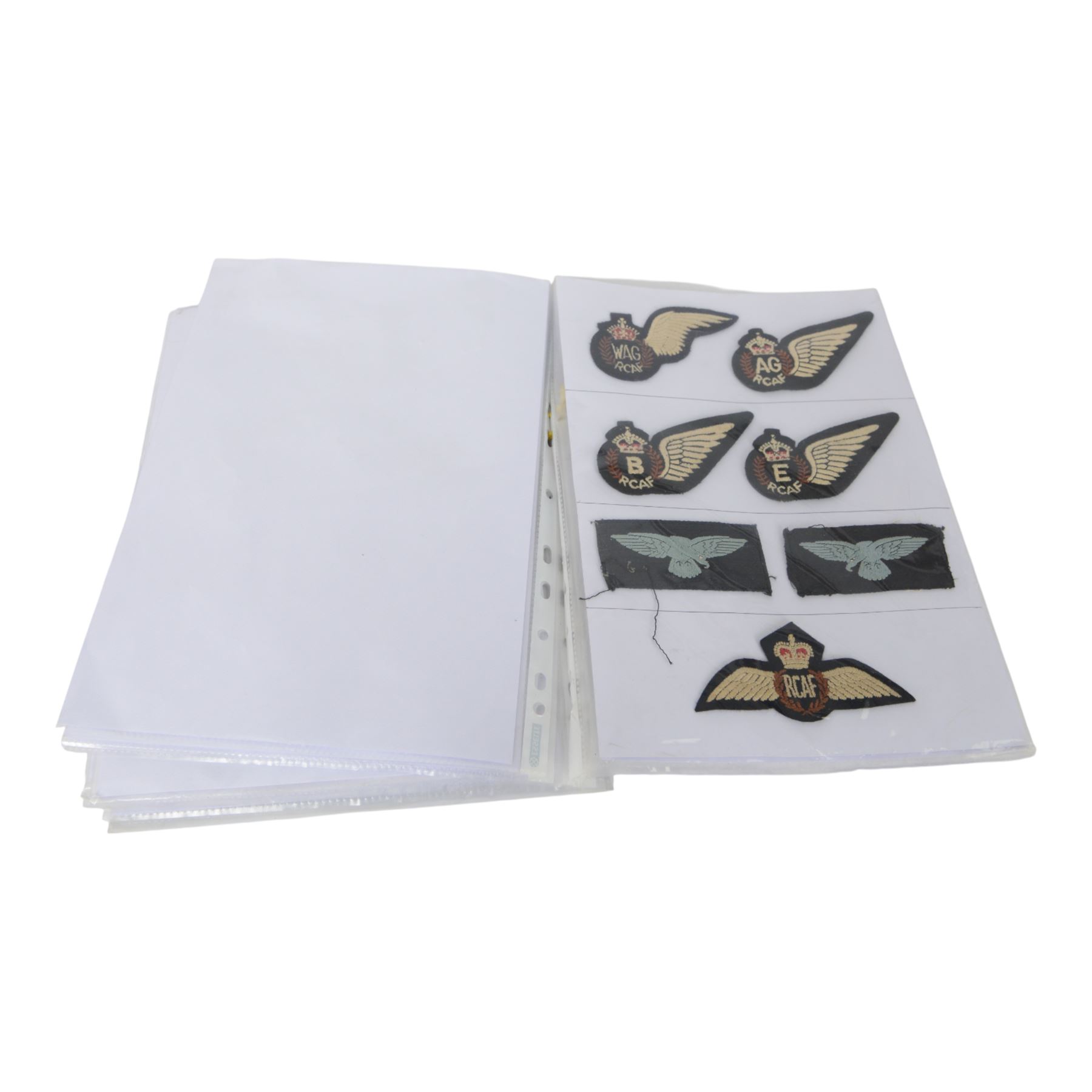 Collection of British cloth insignias, including RAF, Royal Navy/Marine and Parachutist examples 
