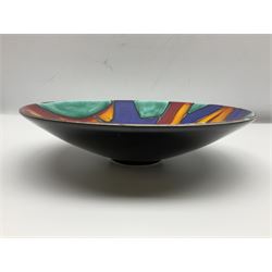 Four pieces of Poole Pottery in Graffiti pattern, comprising pair of vases of baluster form, dish and small plate, with impressed or printed marks beneath, vase H17cm